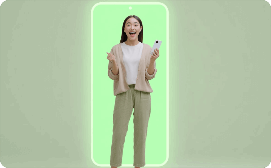 A girl in a light suit holds a phone in her hands. She stands against the background of a green smartphone screen.